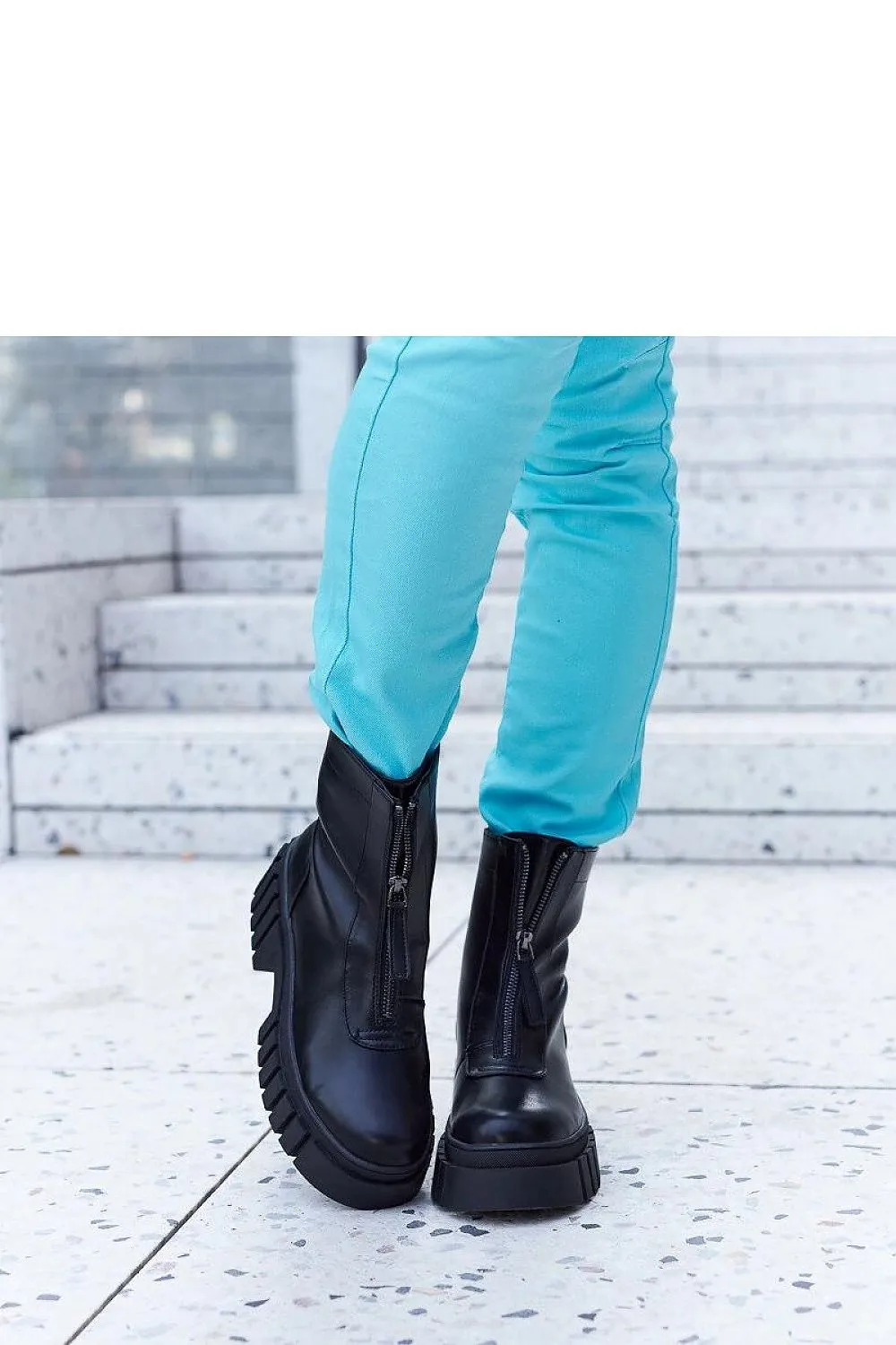 Black lined ankle boots with a zip
